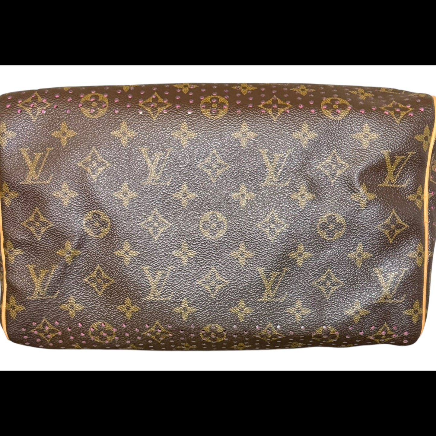 Louis Vuitton Speedy 30 in Monogram Perforated canvas with fuchsia underlay, base view. 