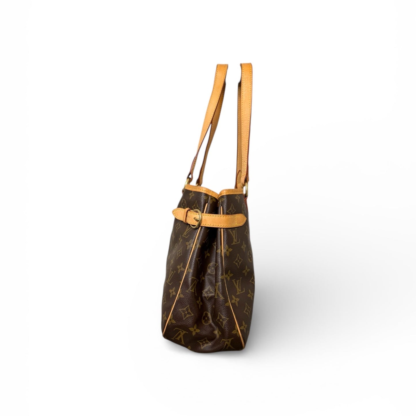 Side profile of Louis Vuitton Batignolles Horizontal showing adjustable buckle gusset and vachetta trim